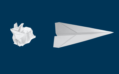 Image of paper airplane being restructured